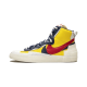 BV0072-700 Blazer Mid Sacai Snow Beach White/Obsidian-University Red-Varsity Maize 